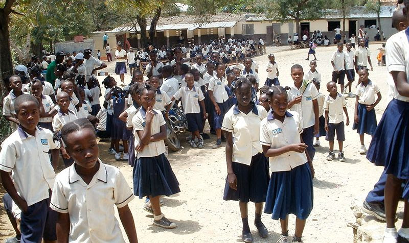 School in Thomassique Praying for Blessing